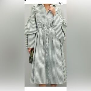 Fiesta dress Rosie Assoulin green and cream print dress from rent the runway